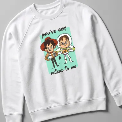 Cartoon design featuring toy characters and the text 'YOU'VE GOT A FRIEND IN ME' in colorful print. — printed on a unisex sweatshirt