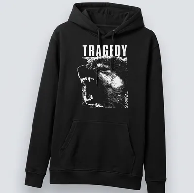 Bold white text 'TRAGEDY SURVIVAL' on a — printed on a unisex hoodie