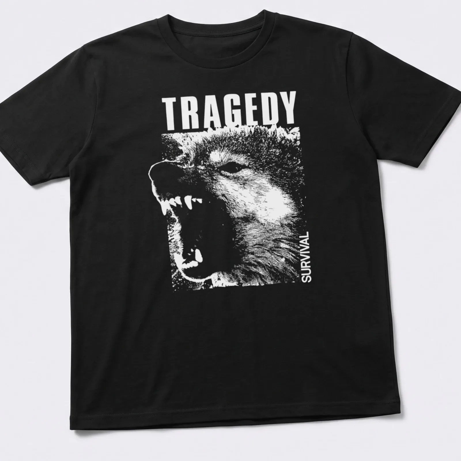 Bold white text 'TRAGEDY SURVIVAL' on a — printed on a unisex t-shirt
