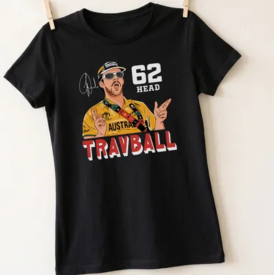 Cartoon illustration of Travis Head with colorful text and graphics — printed on a women's shirt