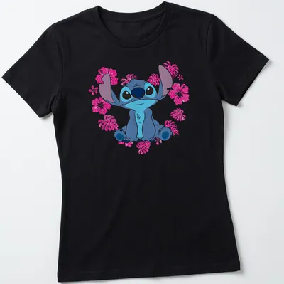 Cartoon alien character Stitch with heart flowers in blue, pink, white, and green. — printed on a women's shirt