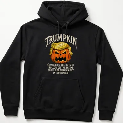 Vintage illustration of a Trumpkin pumpkin with humorous text about November — printed on a unisex hoodie