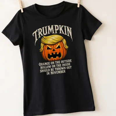 Vintage illustration of a Trumpkin pumpkin with humorous text about November — printed on a women's shirt