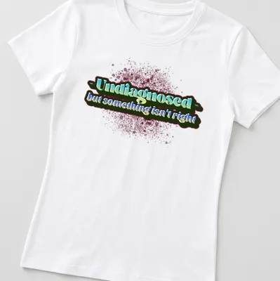 Colorful text design on Undiagnosed shirt with playful typography — printed on a women's shirt