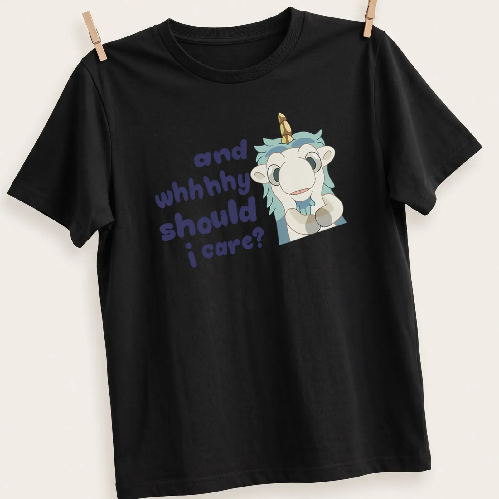 Kawaii Unicorse illustration with playful text in light blue and purple — printed on a unisex t-shirt
