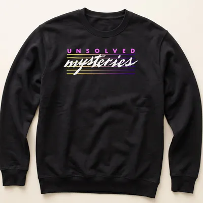 Retro striped tee featuring the text 'UNSOLVED mysteries' in colorful letters. — printed on a unisex sweatshirt