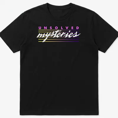 Retro striped tee featuring the text 'UNSOLVED mysteries' in colorful letters.