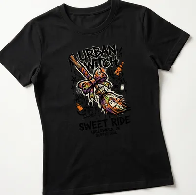 Graffiti-style Urban Witch design with broomstick and colorful text for Halloween. — printed on a women's shirt