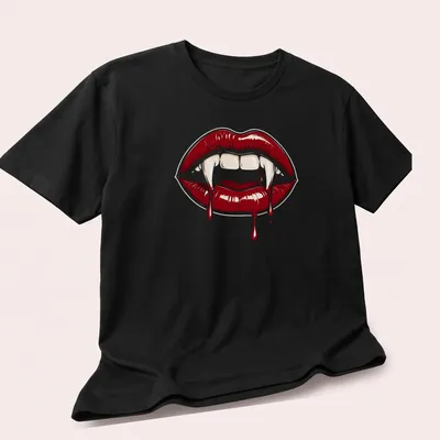 Gothic horror design featuring red vampire lips and fangs in bold colors — printed on a unisex t-shirt (angled view)