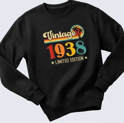 Retro style t-shirt featuring 'Vintage 1938 LIMITED EDITION' in warm colors — printed on a unisex sweatshirt