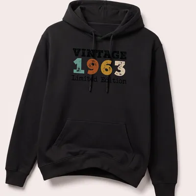 Distressed Vintage 1963 Limited Edition t-shirt with retro typography — printed on a unisex hoodie