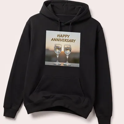 Elegant photography of wine glasses with Happy Anniversary text — printed on a unisex hoodie