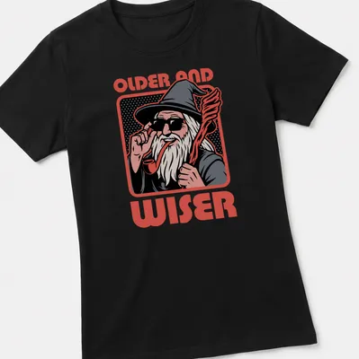 Pop art style print of a wise wizard with the words 'OLDER AND WISER' in bold letters — printed on a women's shirt