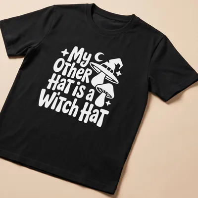 Funny shirt featuring the text My Other Hat Is A Witch Hat with an illustration of a witch hat