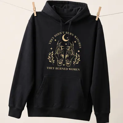Vintage illustration t-shirt with hands and feminist message in gold and white — printed on a unisex hoodie