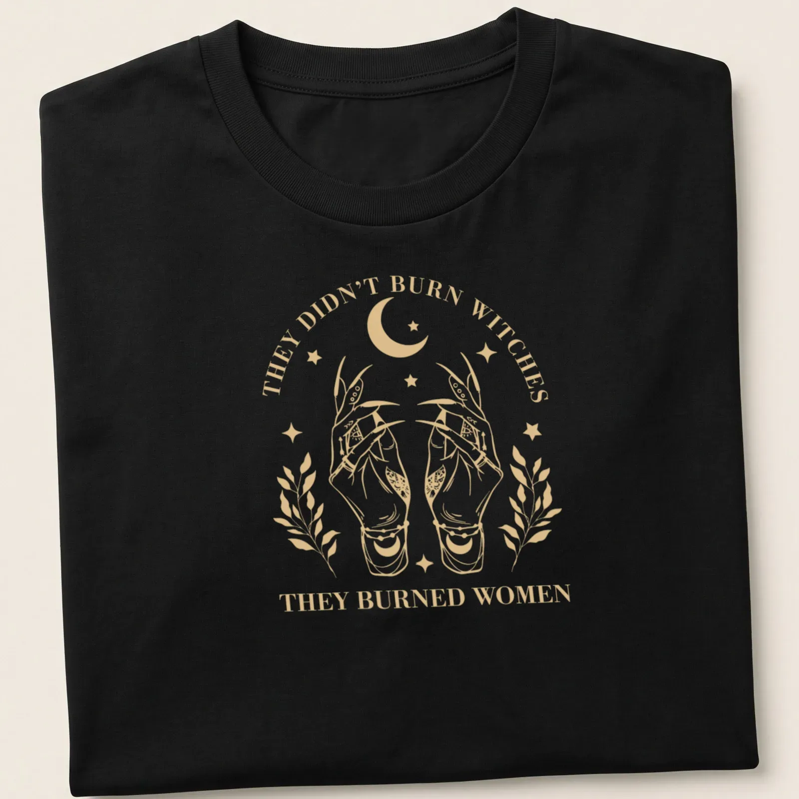 Vintage illustration t-shirt with hands and feminist message in gold and white — printed on a unisex t-shirt